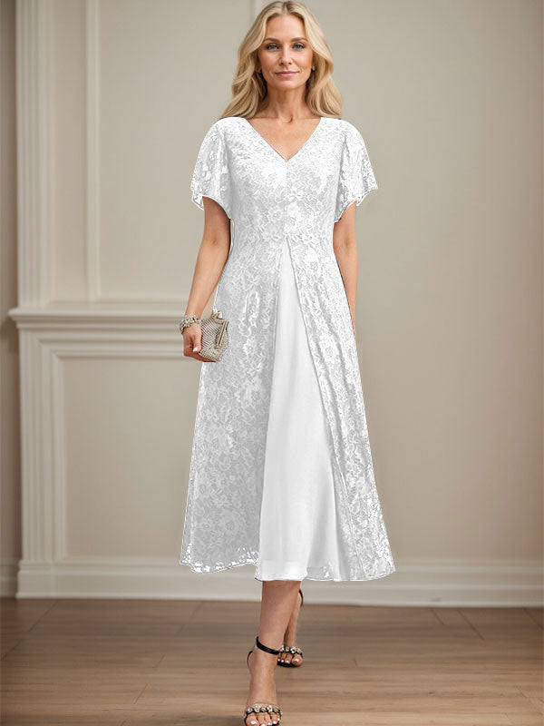 Vestido de novia de gasa de encaje, corte en A, escote en V y largo hasta la rodilla. 