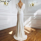 White Luxury Beaded Tassel Elegant Evening Dresses 2025 Cap Sleeve Mermaid For Women Wedding Party LA70571