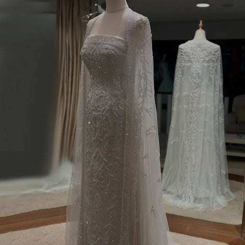 Vestido de noche de lujo con capa larga de sirena blanca, estilo Dubái, Arabia Saudita, con abalorios, para ocasiones formales (2025, LA72870)