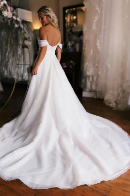 Robe de mariée blanche à épaules dénudées et fente haute