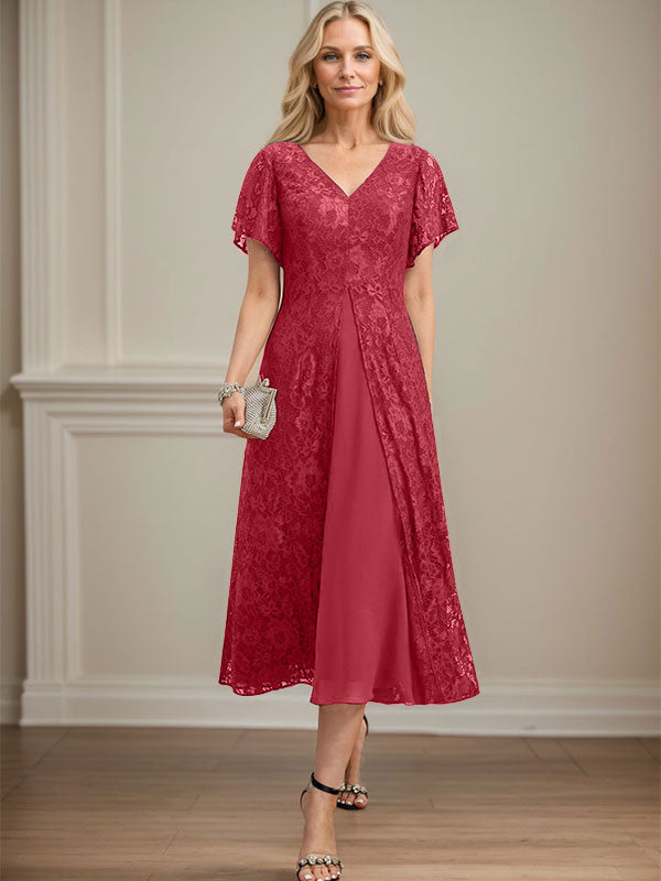 Vestido de novia de gasa de encaje, corte en A, escote en V y largo hasta la rodilla. 
