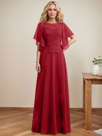 Vestido de novia de corte A, escote redondo, ilusión, largo hasta el suelo, de encaje y gasa con lentejuelas. 