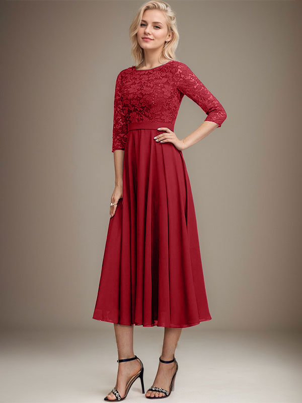 Vestido de novia de corte línea A, escote redondo, largo hasta la rodilla, de encaje y gasa con lentejuelas.