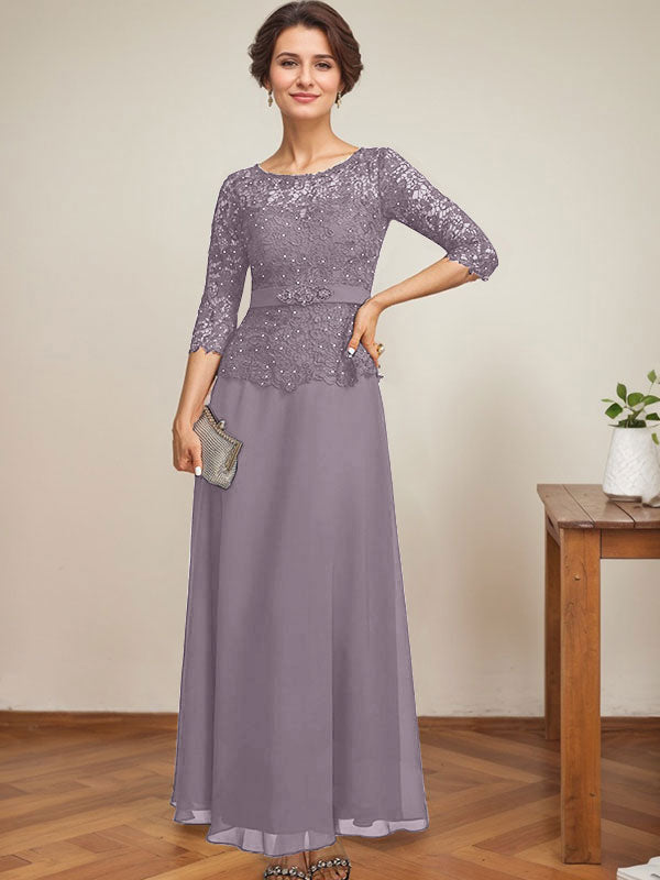 Vestido de novia corte A, escote redondo ilusión, largo hasta el tobillo, de gasa y encaje, con pedrería y detalles de diamantes de imitación. 