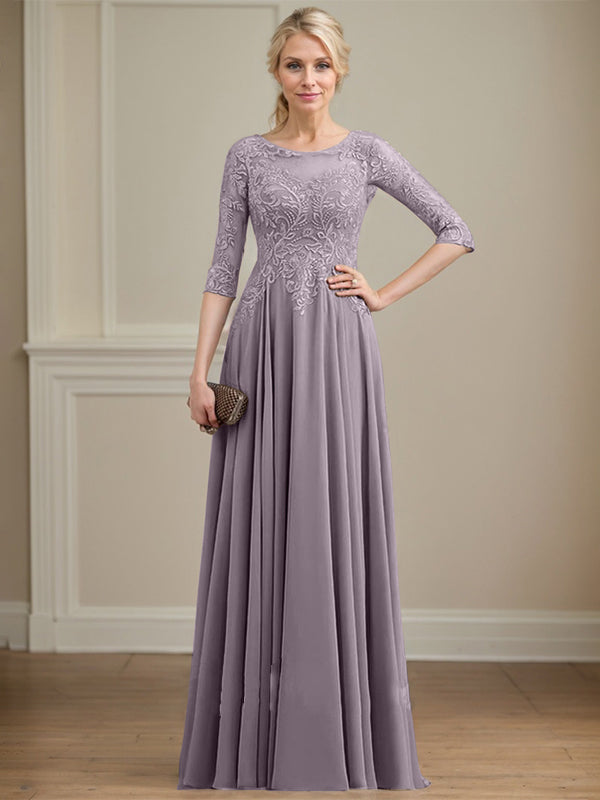Vestido de novia de corte A, escote redondo, ilusión, largo hasta el suelo, de encaje y gasa con lentejuelas. 