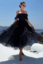 Vestido de fiesta de tul con volantes y corsé de corte en A