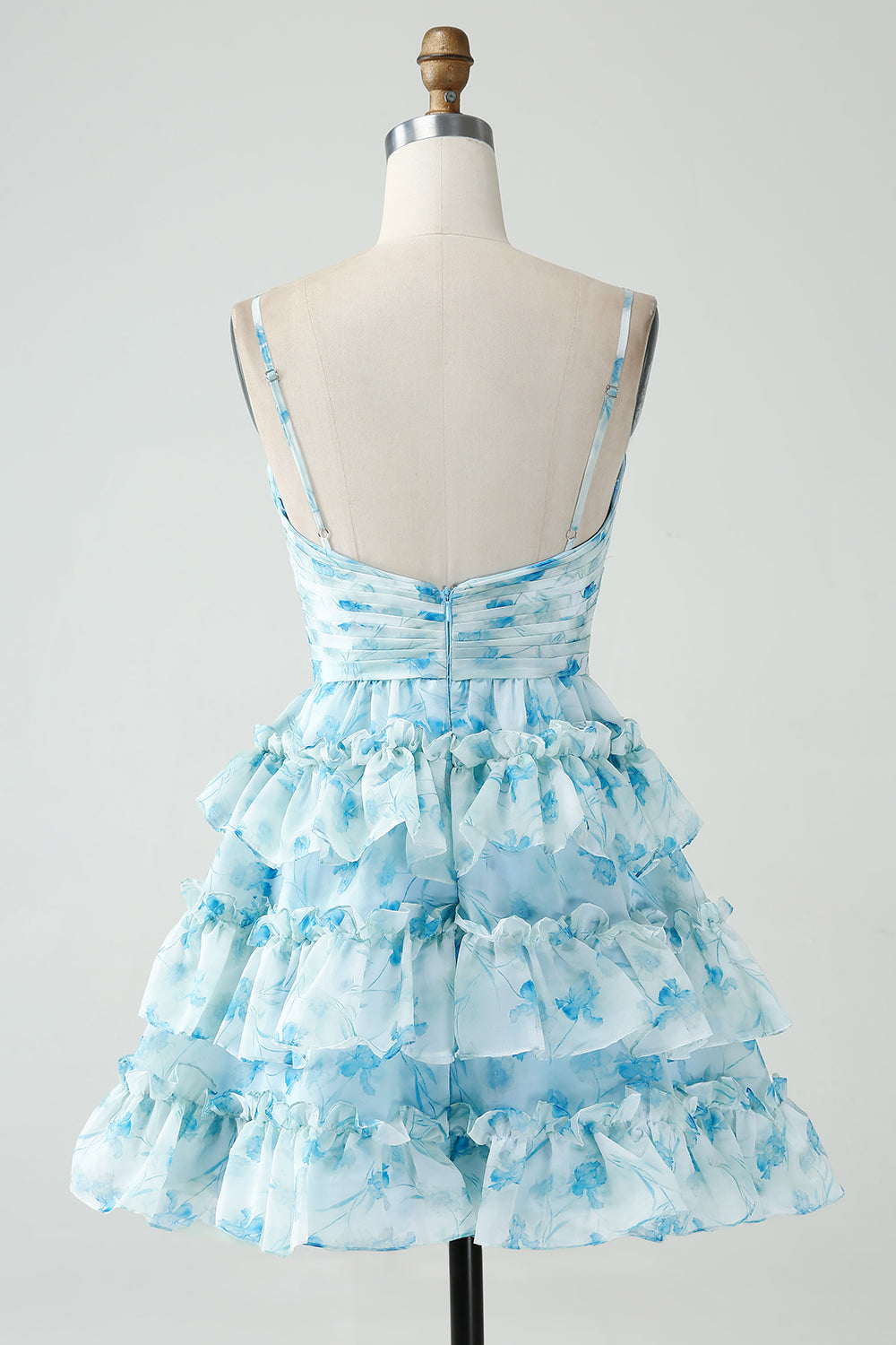 Vestido corto de fiesta de bienvenida con tirantes finos, corte en A, volantes y estampado floral.