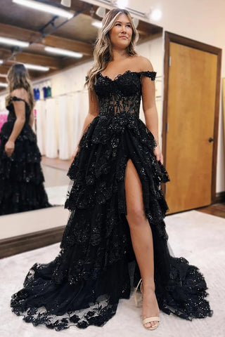 Robe de bal longue en tulle à bustier à volants, coupe trapèze, épaules dénudées et fente.