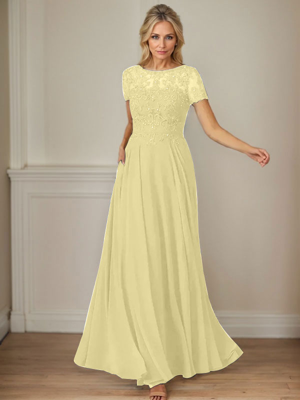 Robe en mousseline de soie bleu marine foncé, coupe trapèze, col bateau et sequins 