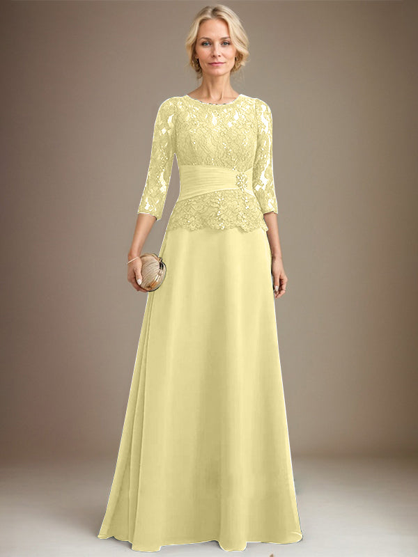 Vestido de corte A, escote ilusión, largo hasta el suelo, de gasa y encaje, para la madre de la novia, con lentejuelas plisadas y pedrería. 