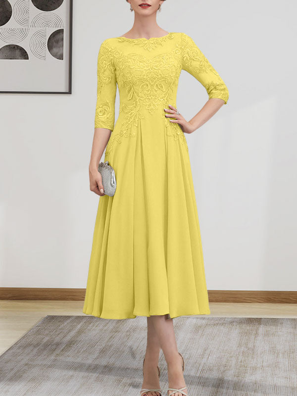 Vestido de novia de corte A, escote redondo ilusión, largo té, de gasa, encaje, con lentejuelas y pedrería.
