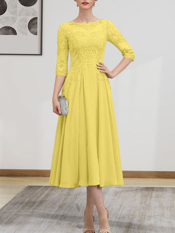 Vestido de novia de corte A, escote redondo ilusión, largo té, de gasa, encaje, con lentejuelas y pedrería.