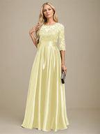 Robe de mariée longue en satin stretch dentelle et dentelle, coupe trapèze, décolleté illusion, ornée d'un nœud à sequins 