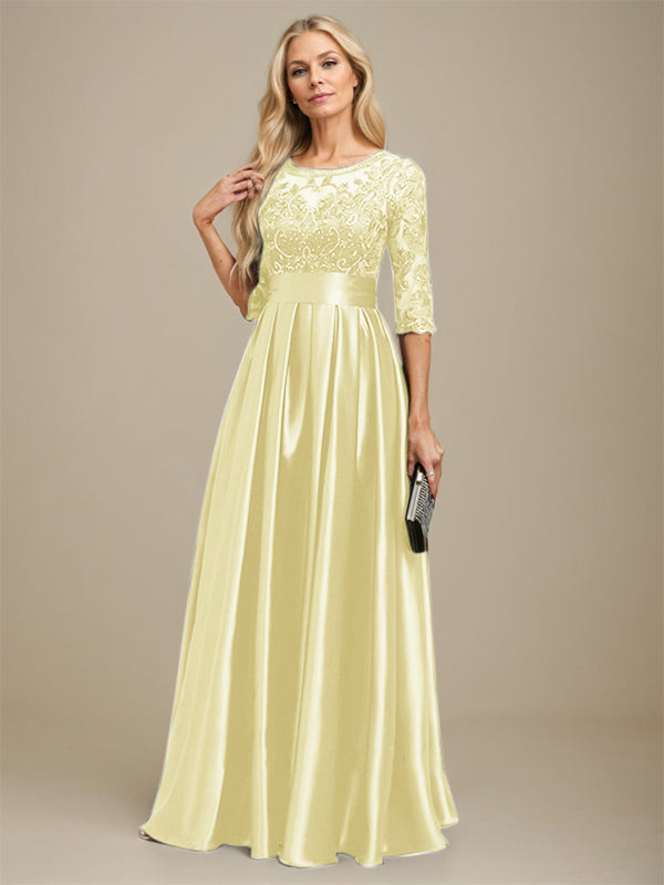 Vestido de madrina de la novia, corte en A, escote ilusión, largo hasta el suelo, satén elástico con encaje y lazo de lentejuelas. 