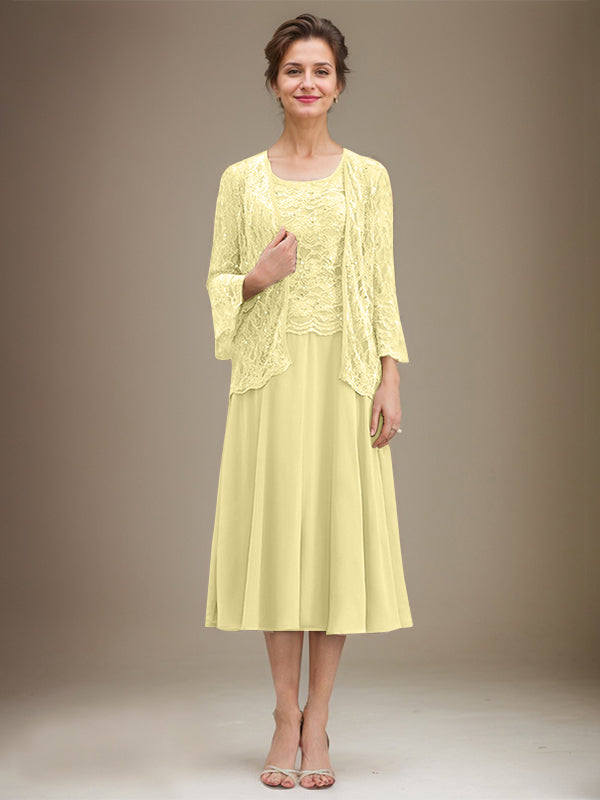 Vestido de novia de corte línea A, escote redondo, largo hasta la rodilla, de encaje y gasa con lentejuelas. 