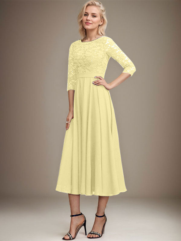 Vestido de novia de corte línea A, escote redondo, largo hasta la rodilla, de encaje y gasa con lentejuelas.