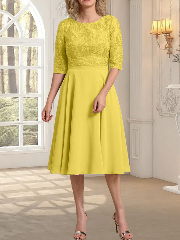 Vestido de novia de gasa de encaje, corte en A, escote redondo y largo hasta la rodilla.