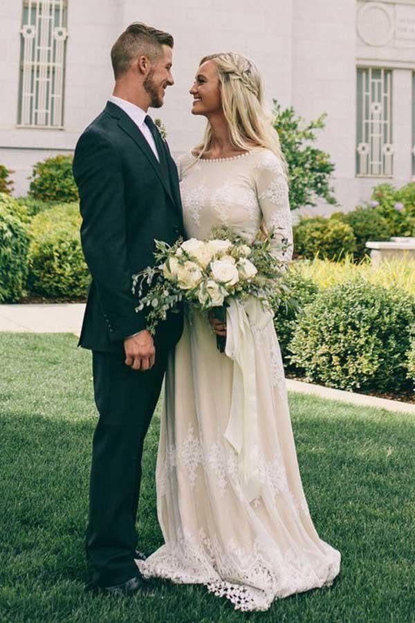Vestido de novia de tul color marfil, corte línea A, escote barco, mangas largas y apliques WD399