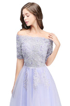 Vestido de fiesta de tul con escote barco y apliques