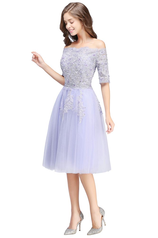 Vestido de fiesta de tul con escote barco y apliques