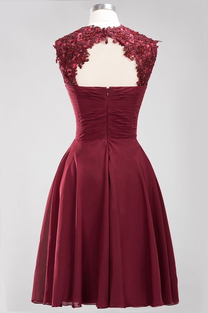Robes de demoiselle d'honneur trapèze en mousseline ornées d'appliques et de bijoux, sans manches, arrivant au genou et à volants
