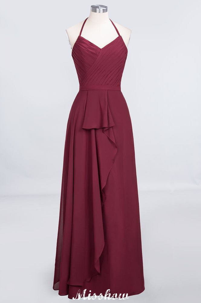 Robe de demoiselle d'honneur longue sans manches, en mousseline de soie, coupe trapèze, col halter en V et volants.