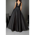 Vestidos de noche largos negros de corte formal, con escote en V profundo, cinturón y bolsillos. 