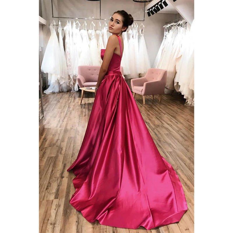 Vestido largo de fiesta corte A con tirantes dobles, abertura y bolsillos 