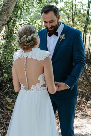 Vestido de novia de tul blanco con cola de barrido, corte línea A y apliques, modelo WD459