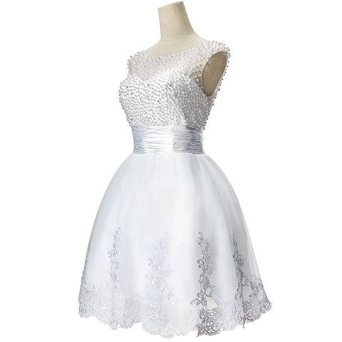 Robe de soirée trapèze en tulle ornée de perles