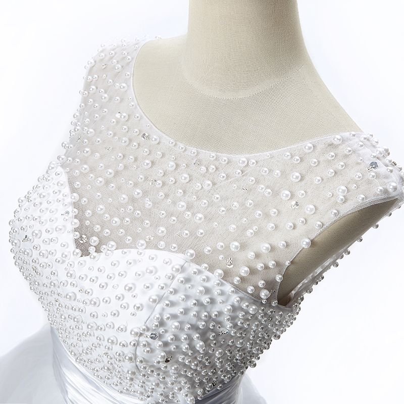 Vestido de fiesta de tul con joyas y corte en A