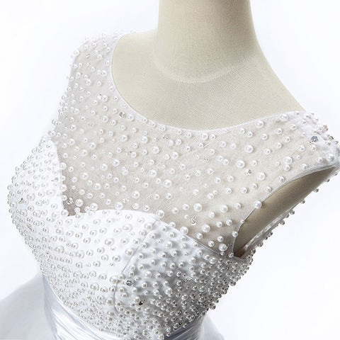 Robe de soirée trapèze en tulle ornée de perles