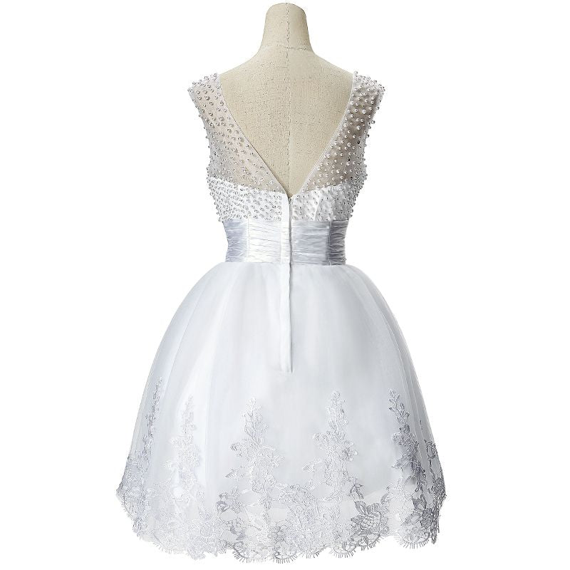 Vestido de fiesta de tul con joyas y corte en A