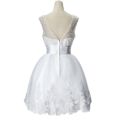 Robe de soirée trapèze en tulle ornée de perles