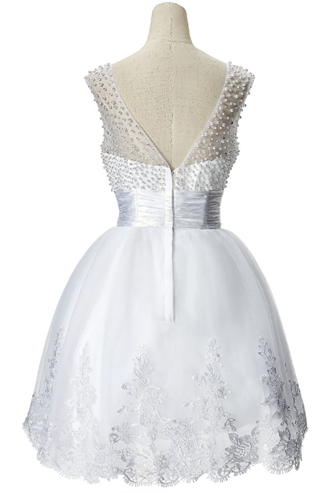 Vestido de fiesta de tul con joyas y corte en A