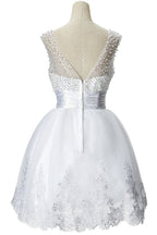 Vestido de fiesta de tul con joyas y corte en A