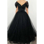 Vestidos de noche formales negros brillantes con hombros descubiertos y cuentas 