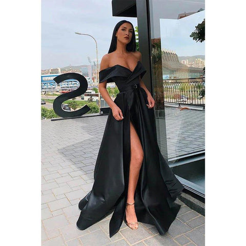 Vestido largo de fiesta de corte A, con hombros descubiertos, abertura alta y bolsillos. 