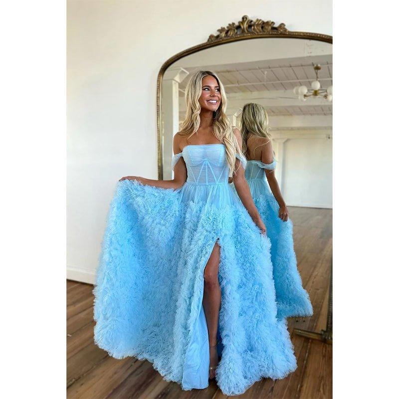 Vestido largo de fiesta con hombros descubiertos, volantes y abertura lateral