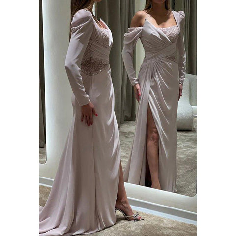 Vestido de noche formal de corte A, asimétrico, con mangas largas y cuentas. 