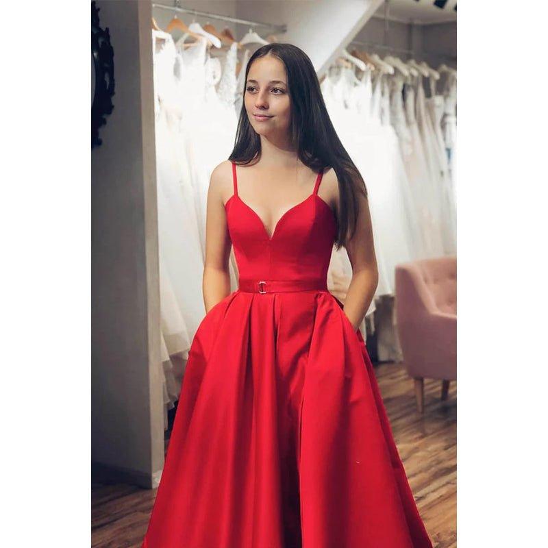 Vestido largo de fiesta rojo satinado de corte A, escote en V, abertura alta y bolsillos. 