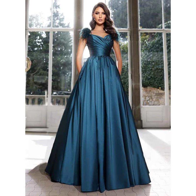 Vestido largo de fiesta elegante, de satén, con pliegues, plumas y corte en A, con bolsillos. 