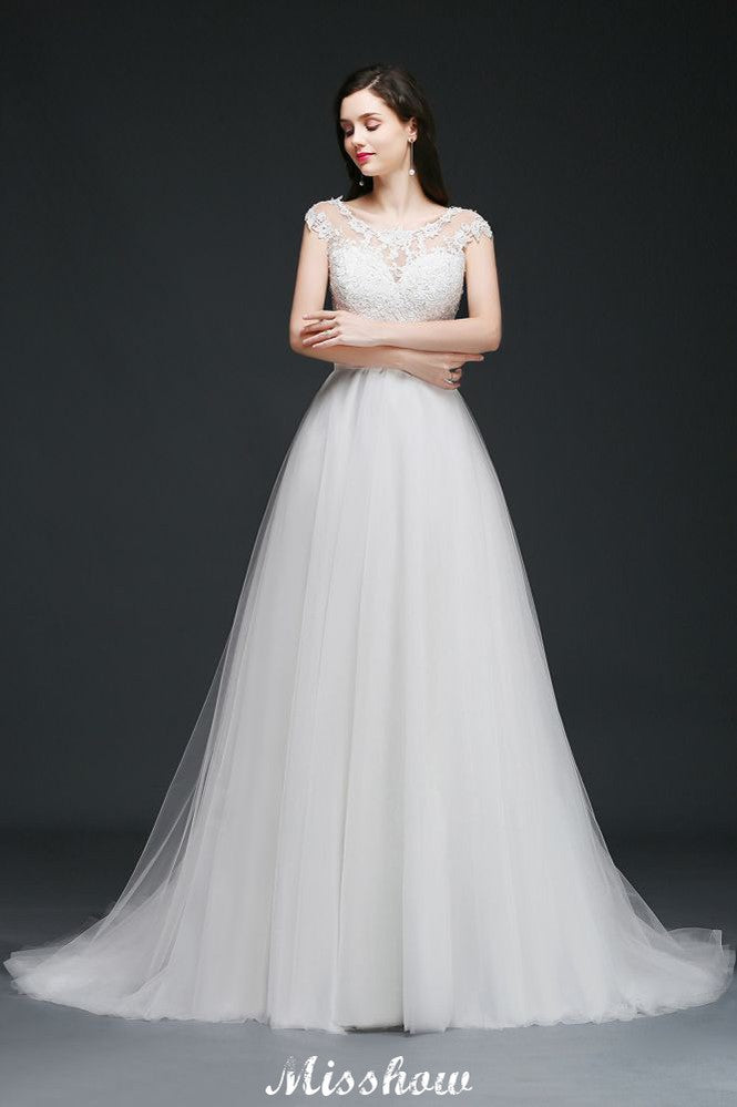 Vestidos de novia glamurosos de tul con corte en A, escote redondo y cola de corte, con fajín.