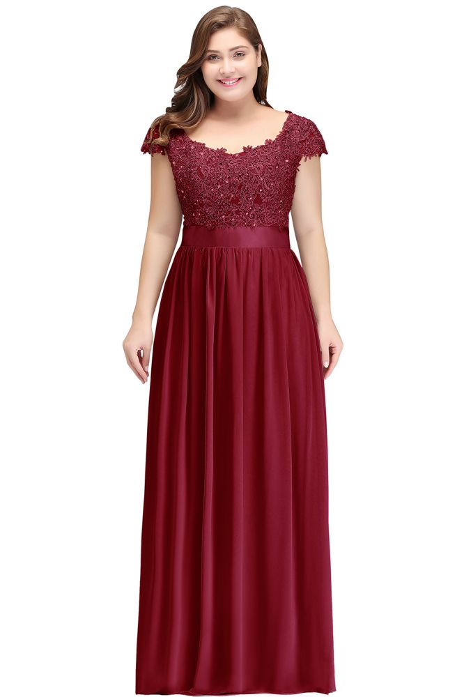Vestido de noche plateado de corte A, escote redondo, largo hasta el suelo, mangas cortas, apliques y fajín.