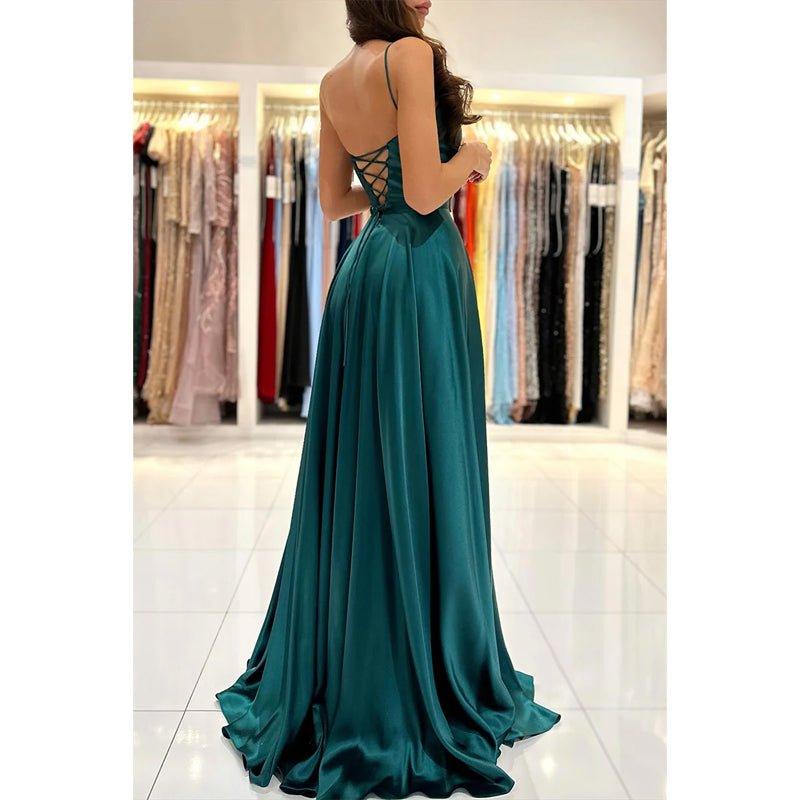 Vestido largo de fiesta sencillo, de corte línea A, con escote redondo, abertura alta y bolsillos.