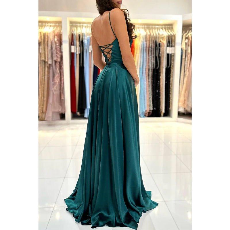 Vestido largo de fiesta sencillo, de corte línea A, con escote redondo, abertura alta y bolsillos.