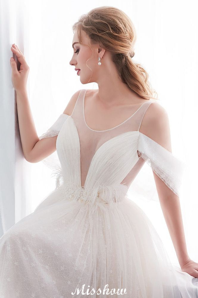 Robe de mariée ivoire en dentelle, coupe trapèze, sans manches, longueur au sol, coupe trapèze.