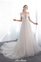 Robe de mariée ivoire en dentelle, coupe trapèze, sans manches, longueur au sol, coupe trapèze.