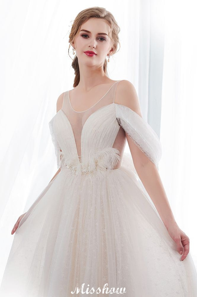 Robe de mariée ivoire en dentelle, coupe trapèze, sans manches, longueur au sol, coupe trapèze.