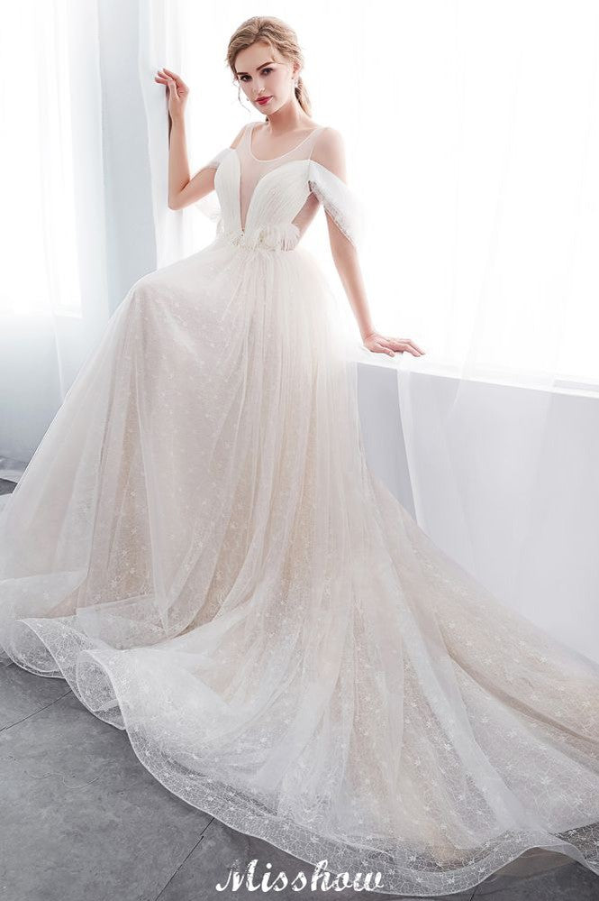 Robe de mariée ivoire en dentelle, coupe trapèze, sans manches, longueur au sol, coupe trapèze.